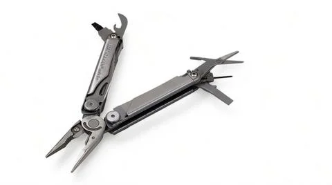 Opened modern steel multitool with pliers, file, blade, screwdriver, scissors Stock-Fotos