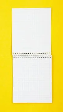 Opened note book, isolated on white background Photos