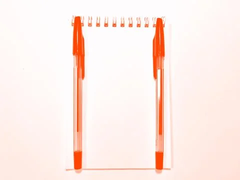 Opened notebook paper with pen on white desk, copy space. Lush Lava Stock Photos