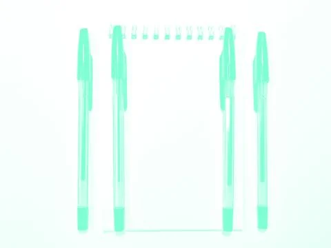 Opened notebook paper with pen on white desk, copy space. Aqua Menthe Stock Photos