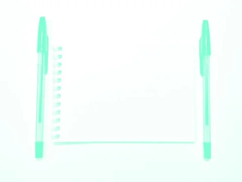 Opened notebook paper with pen on white desk, copy space. Aqua Menthe Stock Photos