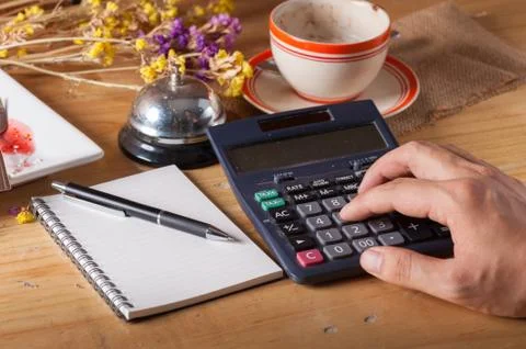 Opened notebook on wood table Stock Photos