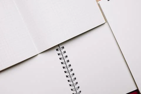 Opened notebooks with white pages Resolution and high quality beautiful photo Stock Photos