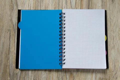 Opened notepad on wooden background Stock Photos