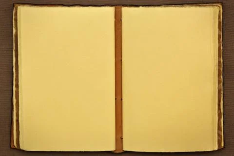 Opened old book usable like a background Stock Photos