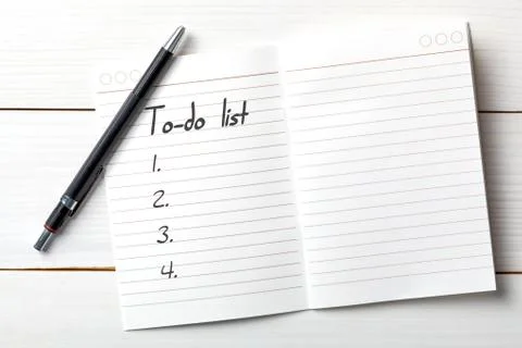 Opened personal organizer with a to do list. Stock Photos