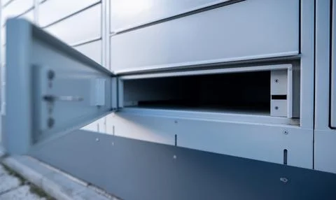 Opened Pickup Cell Of Parcel Automated Locker Stock Photos
