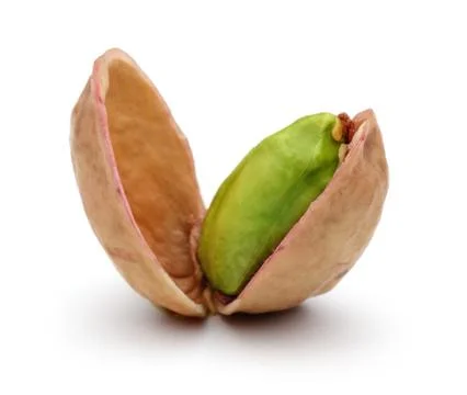 Opened pistachio nut on white background Stock Photos