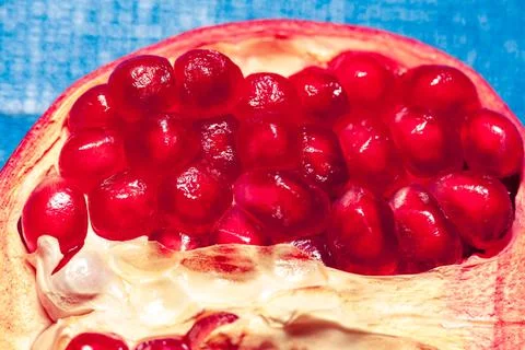 Opened pomegranate fruit Stock Photos
