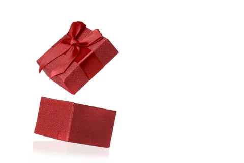 Opened red gift on a white background. 库存照片