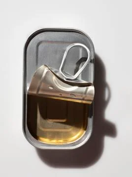 Opened sardine can Stock Photos