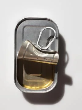 Opened sardine can Stock Photos