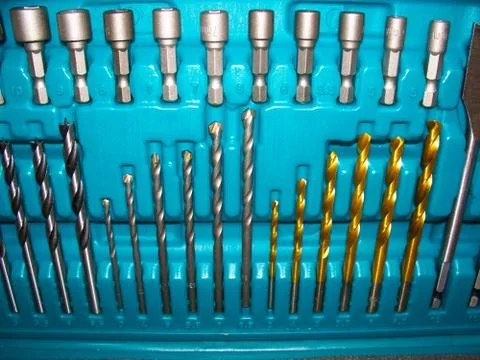 An Opened Silver Case Containing Drill Bits Stock Photos