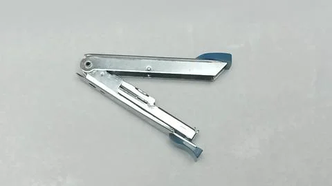 Opened Silver Desktop Paper Stapler on White Surface Stock Photos