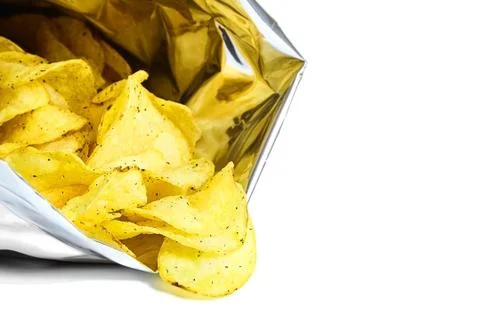 Opened silver pack of delicious spicy potato chips Stock Photos