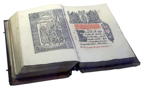 Opened Slavic ancient book written in old Cyrillic Stock Photos