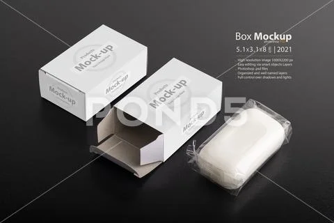 Opened soap package box on black surface mock-up series Modello PSD