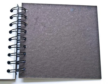 Opened spiral binding notebook cover on white Stock Photos