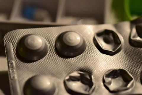 Opened tablets blister as a close up Stock Photos