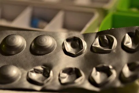 Opened tablets blister as a close up Stock Photos