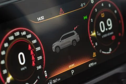Opened trunk warning. Modern car dashboard with speedometer, tachometer. Stock Photos