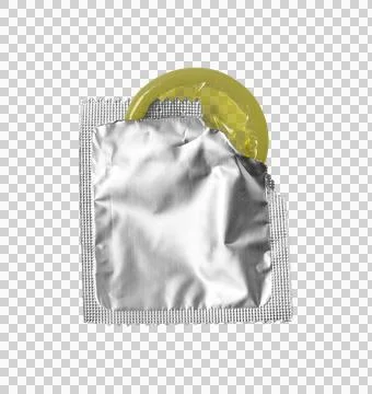 Opened Yellow Condom in Silver Wrapper Stockfoto's