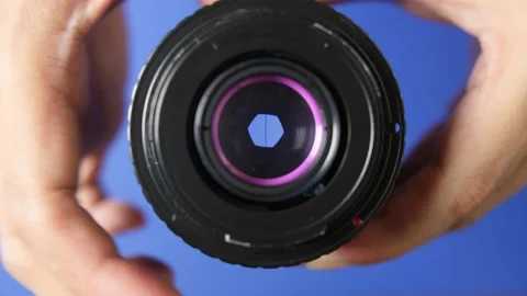 Opening and closing of aperture of modified vintage Russian lens, close up Stock Footage 161869885