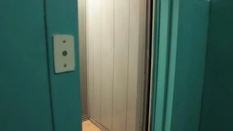 The opening and closing of elevator doors green 写真素材