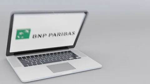Opening and closing laptop with BNP Paribas logo on the screen. Computer Stock Footage