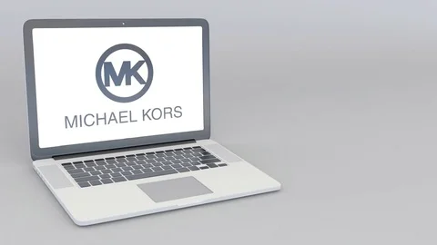 Opening and closing laptop with Michael Kors logo. 4K editorial animation Stock Footage 82149946