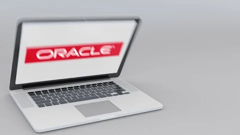 Opening and closing laptop with Oracle Corporation logo on the screen. Computer Stock Footage 73133632