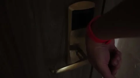 Opening and closing a modern electronic lock using an electronic key bracelet on Stock-Footage 304109896