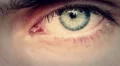 opening and closing of one eye of young man very sad - tears HD Footage