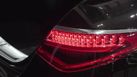 Opening and closing the trunk with an automatic tailgate closer on the car Stock Footage 149976875