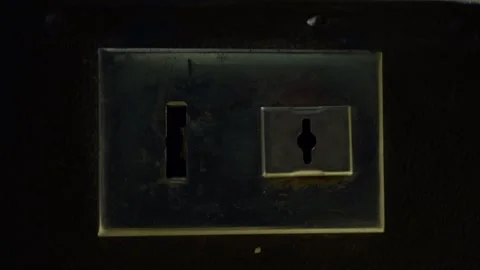 Opening and closing a unique lock on a vintage suitcase. Stock Footage 257366510