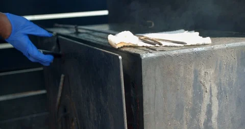 Opening Up an Authentic Wood Burning Fire Grill, Barbecue Stock Footage 115043543