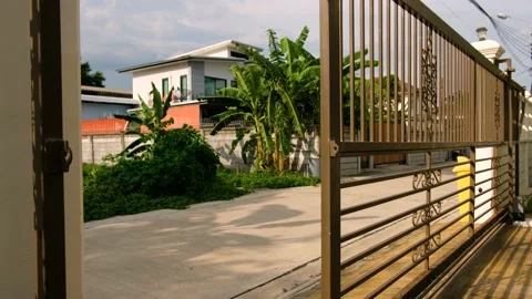 Opening of Automatic House Gates Stock Footage 221688770