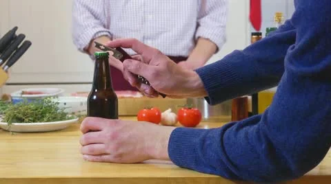 Opening a beer bottle Stock Footage 17817065