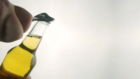 Opening a beer bottle. Light beer. Stock Footage 205075620
