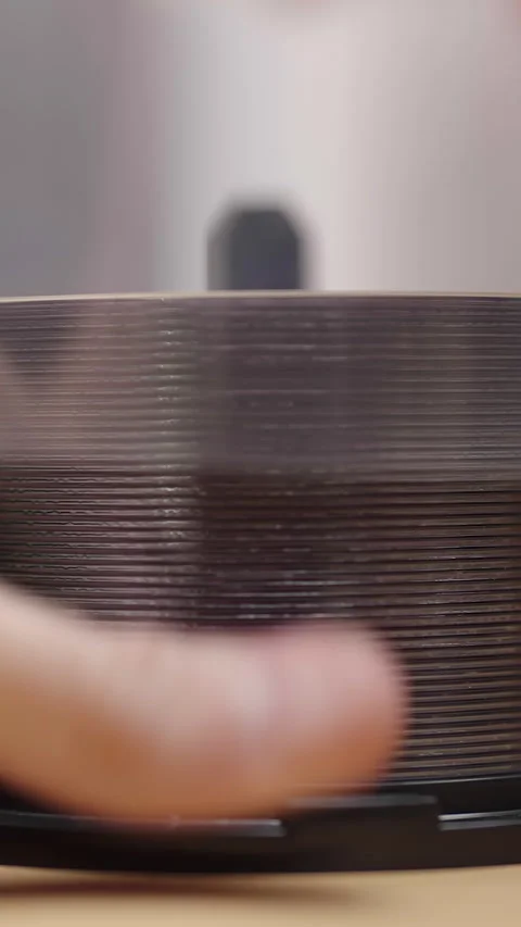 Opening big cake of burnable DVD or CD media packaging Stock Footage 324967468