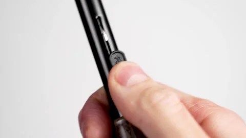 Opening the black automatic umbrella with PUSH button on handle Vidéo 258890962