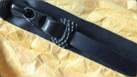 Opening black zipper, close-up Stock Footage 110729374