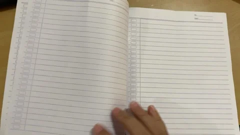 Opening blank line pages of a book Stock Footage 284197773
