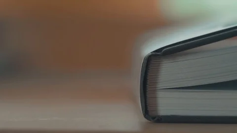 Opening a book Stock Footage 94629122