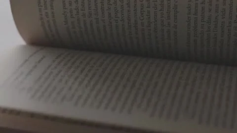 Opening a book Stock Footage 158313361