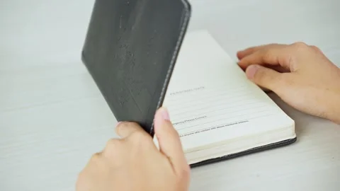 Opening a Book From Side View Video stock 347179018