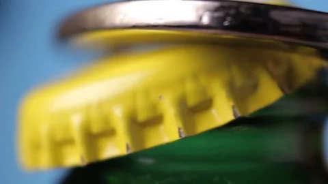 Opening  bottle cap in macro shot Stock Footage 116098937