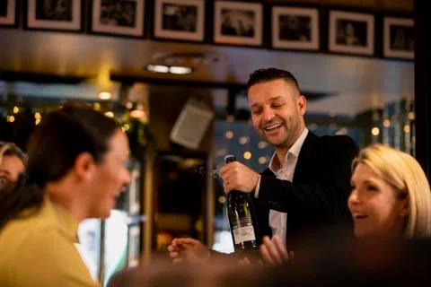 Opening a Bottle of Prosecco Fotos Stock