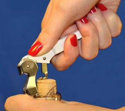 Opening a bottle of wine Stock Photos