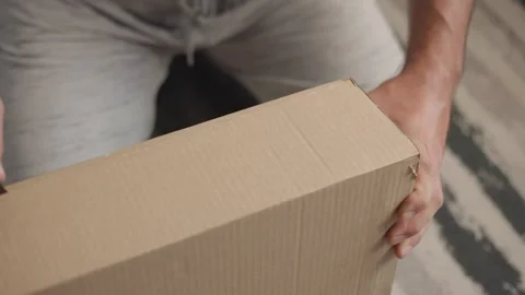 Opening Box and Taking Out Furniture Parts on Floor Video stock 344145994